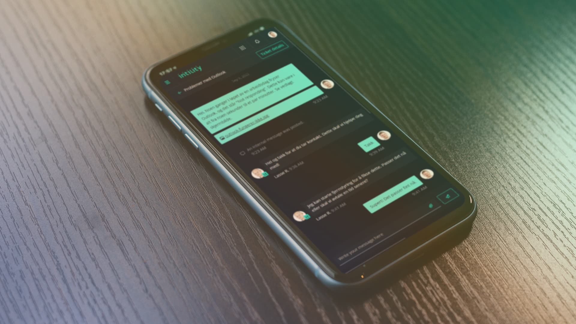 A mocup of a phone with a Intility app open designed with Bifrost